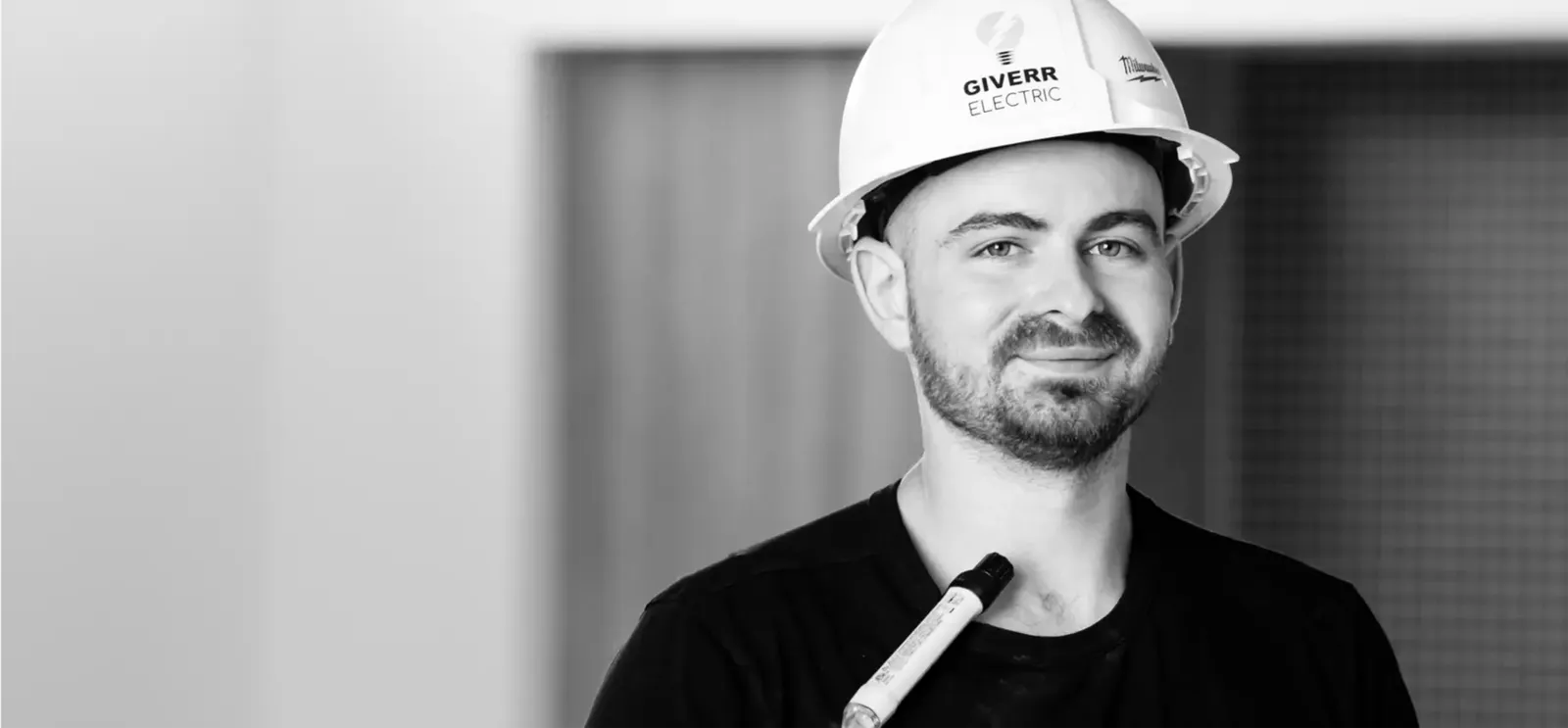 man with hardhat smiling